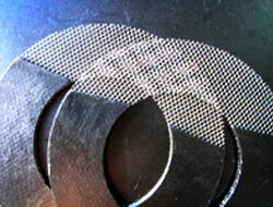 Grafite-gasket fersterke mei metallyske mesh